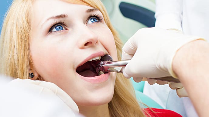 хирургическое удаление зуба